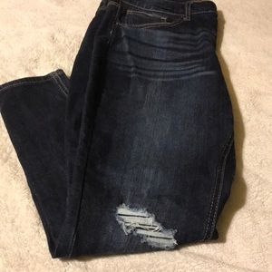 Dark rinse skinny distressed jeans